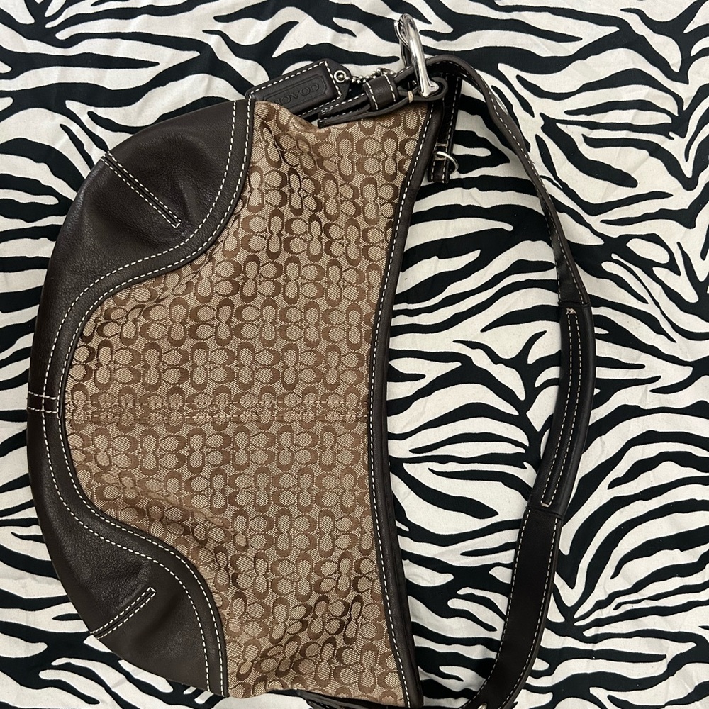 Signature Sufflette cloth handbag
Good condition